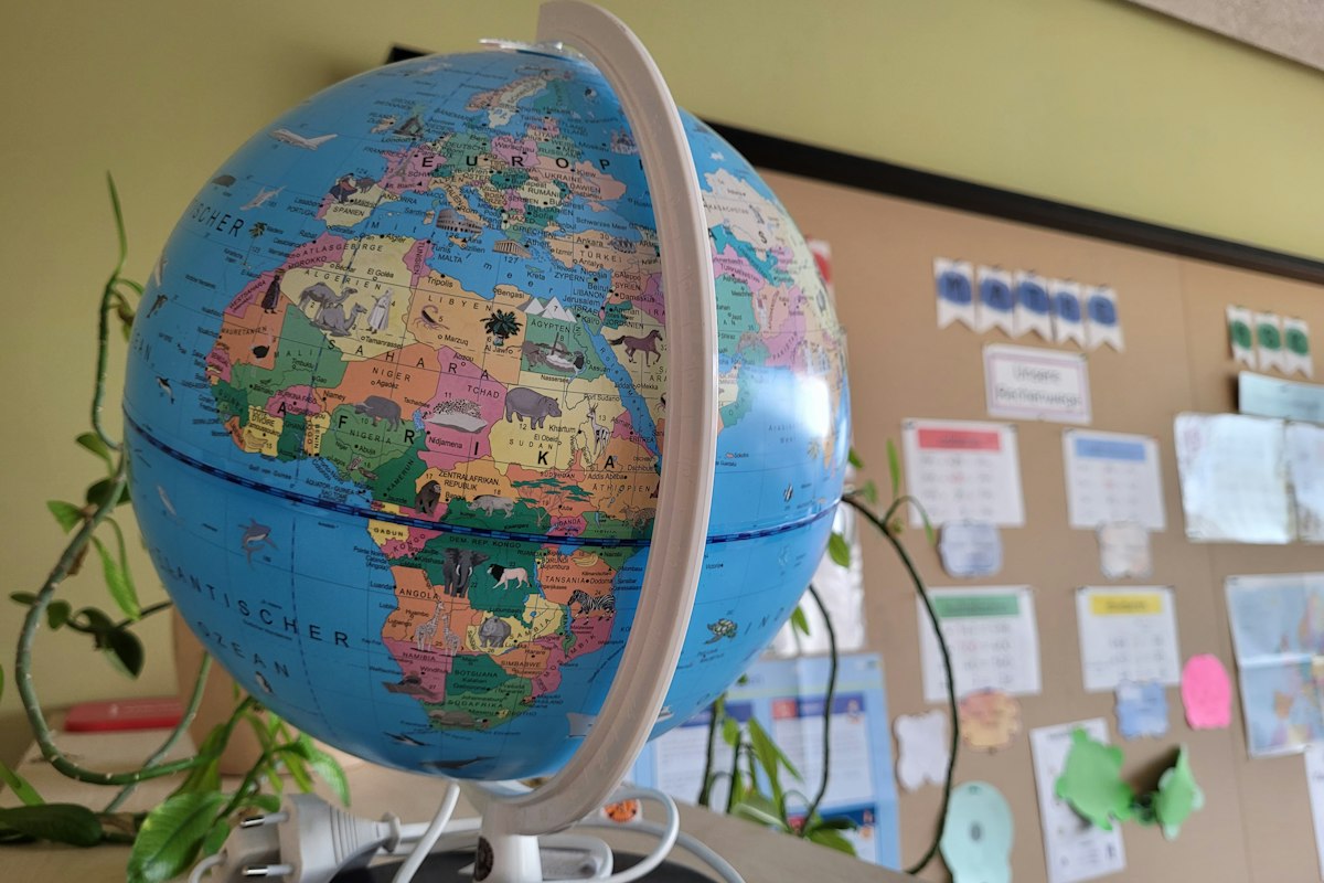 A globe in a classroom in Jena, Germany. Reference photograph illustrating the global economy.